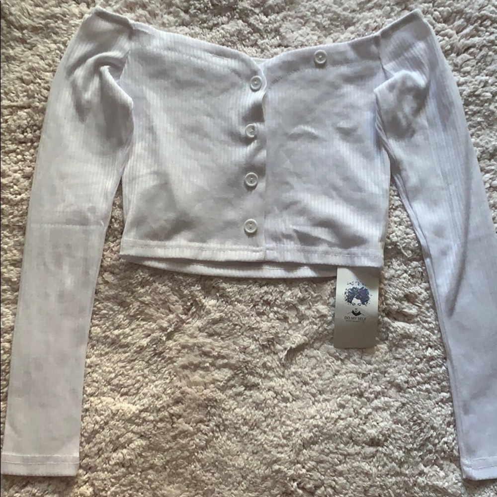 White long sleeve, button up, crop top.